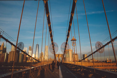 Suspension bridge against sky