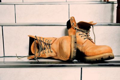 Take a picture with the yellow boots in stairwell .