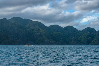 Photo showcases the stunningly rugged coastline of the philippines. a series of rocky outcroppings.
