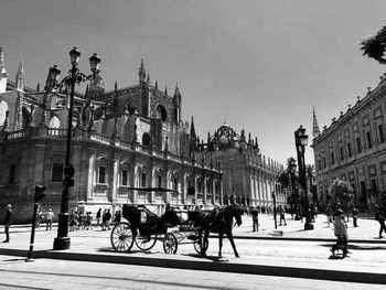 People walking on street in city