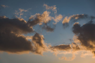 Low angle view of clouds in sky during sunset