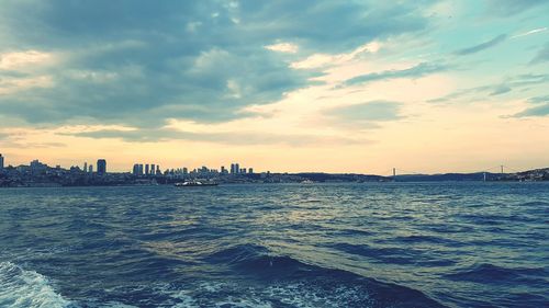 Scenic view of sea against cloudy sky