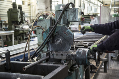 Cropped image of worker in factory