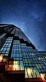 Low angle view of building against sky at night