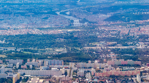 High angle view of townscape against cityscape