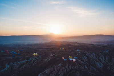 Scenic view of landscape against sky during sunset