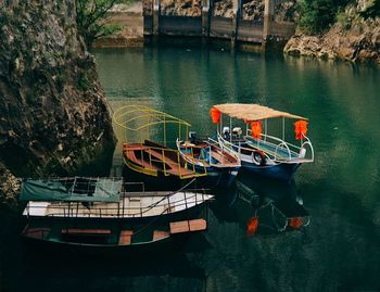 High angle view of fishing boats moored in lake