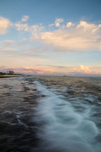 View of sea against cloudy sky