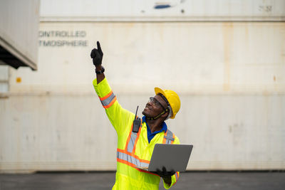 Man working with umbrella