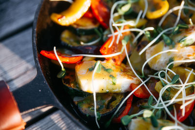 Cropped hand holding food