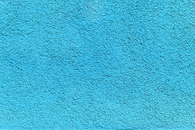 Full frame shot textured blue wall