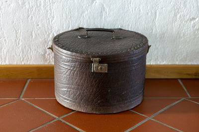 Close-up of tiled floor against wall at home