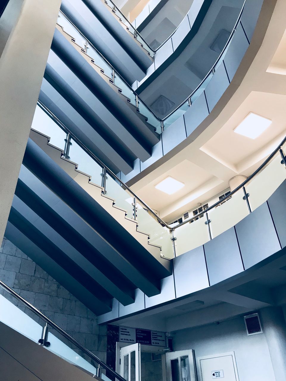 LOW ANGLE VIEW OF STEPS IN MODERN BUILDING