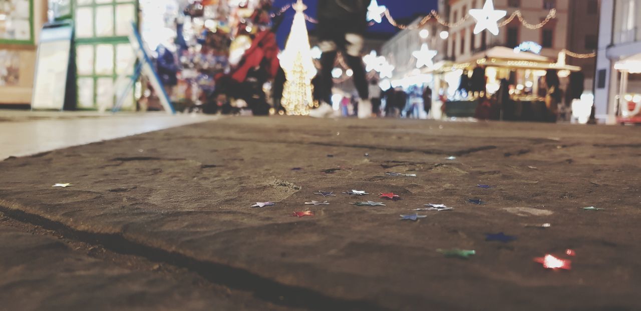 PEOPLE ON TABLE IN CITY