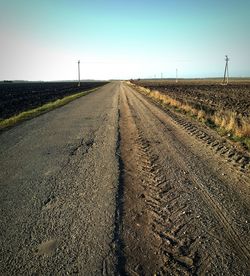 View of dirt road along landscape