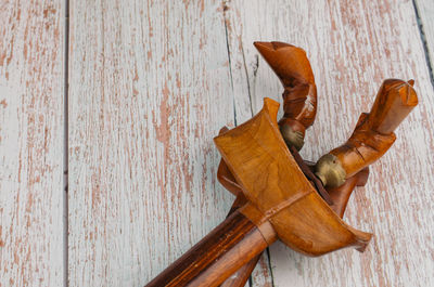 High angle view of carving on wooden table