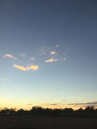 Scenic view of silhouette landscape against sky at sunset