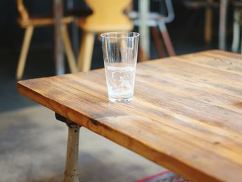 Empty beer glass on table