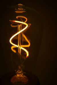 Close-up of illuminated light bulb