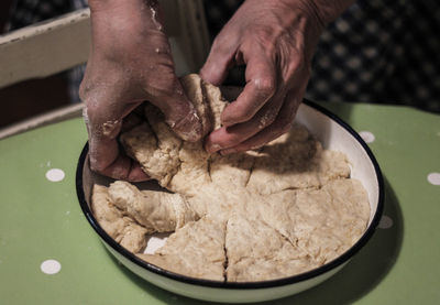 Close-up of person preparing food