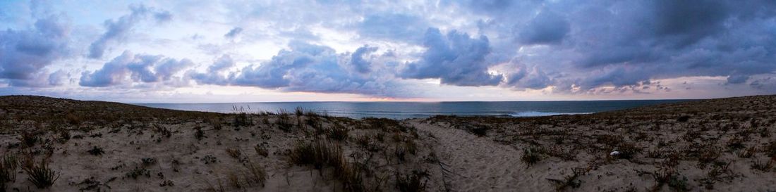 Panoramic view of beach against sky