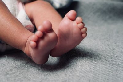 Low section of baby feet