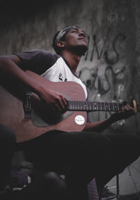 Young man playing guitar