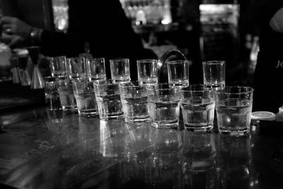 Close-up of wine glasses on table