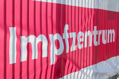 Close-up of text on white wall