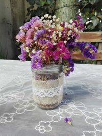 Close-up of purple flowers on table