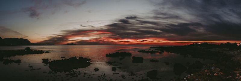 Scenic view of sea against sky at sunset