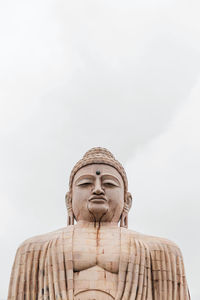 Low angle view of statue against sky