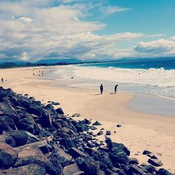 Scenic view of beach against sky