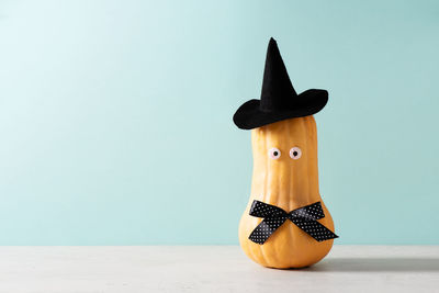 Close-up of bread on table against blue background
