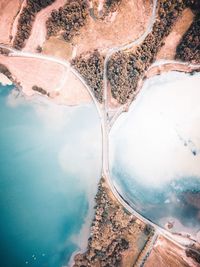 Aerial view of road passing through mountain