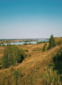 Scenic view of land against clear sky