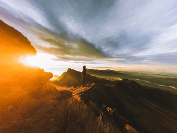 Scenic view of landscape against sky during sunset