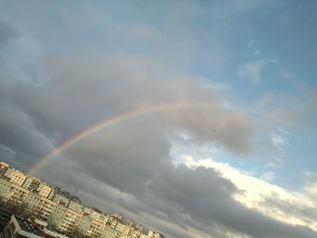 Low angle view of rainbow against sky
