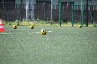 Close-up of soccer ball on field
