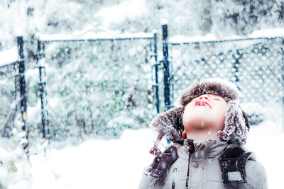Close-up of child in snow