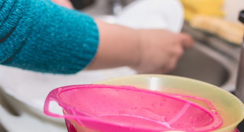 Close-up of hand holding ice cream