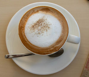 Close-up of coffee cup on table