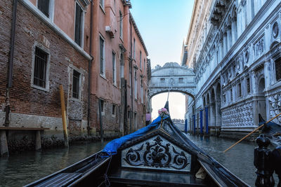 The view of the canal water and the famous bridge of sighs from a gondola ride. venice, italy