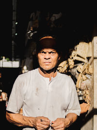 Portrait of a smiling man standing outdoors