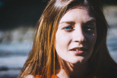 Close-up portrait of young woman