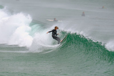 Man surfing in sea