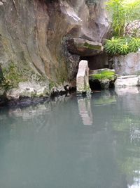 Scenic view of rock formation in lake