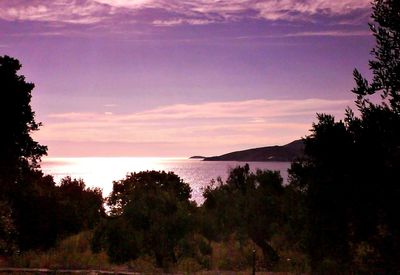 Scenic view of sea against sky at sunset