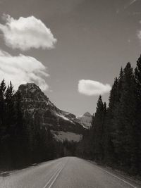 Country road leading towards mountains