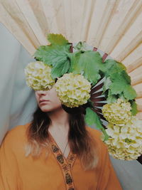 High angle view of woman with flower bouquet